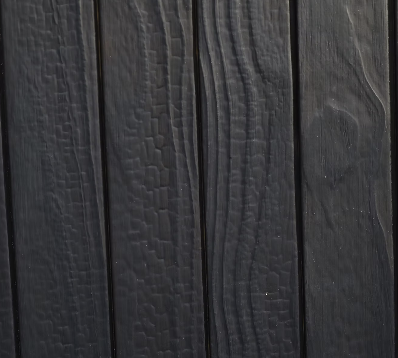 Close-up of KIME Black charred and brushed Accoya
